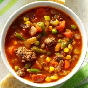 ტომატის წვნიანი გატარებული ხორცით (ფარშით)